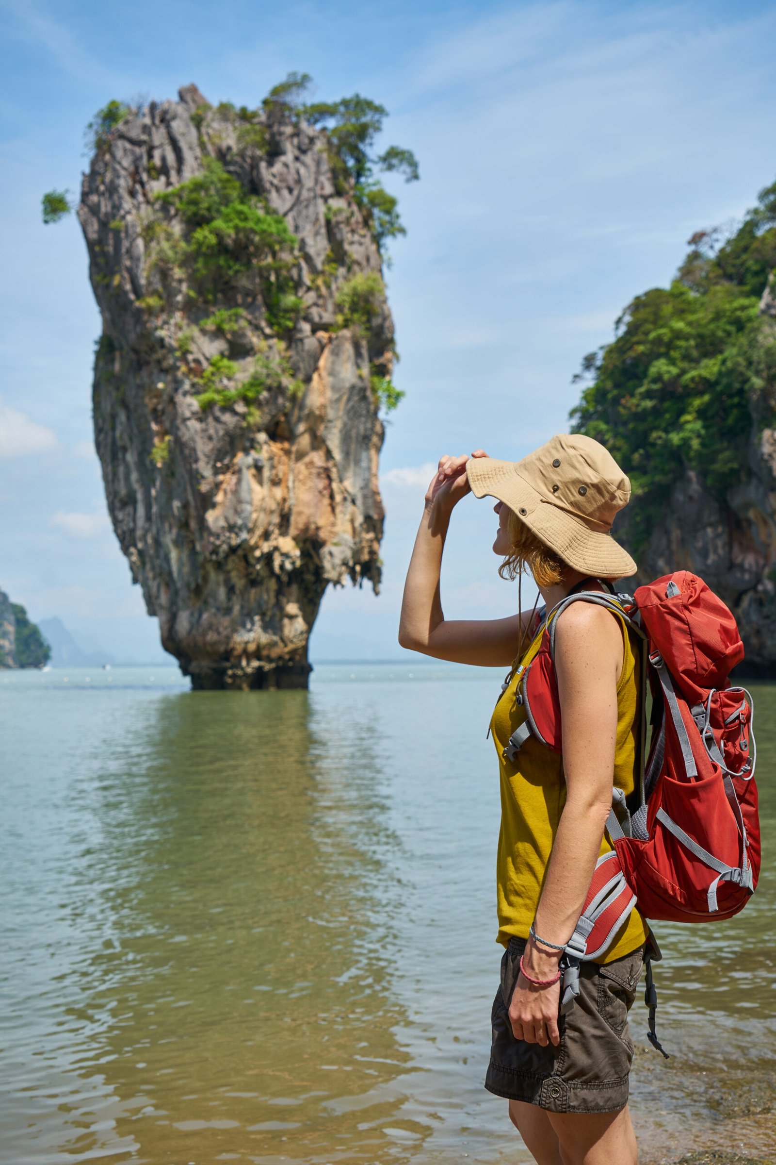 backpacker girl in james bond island, thailand
